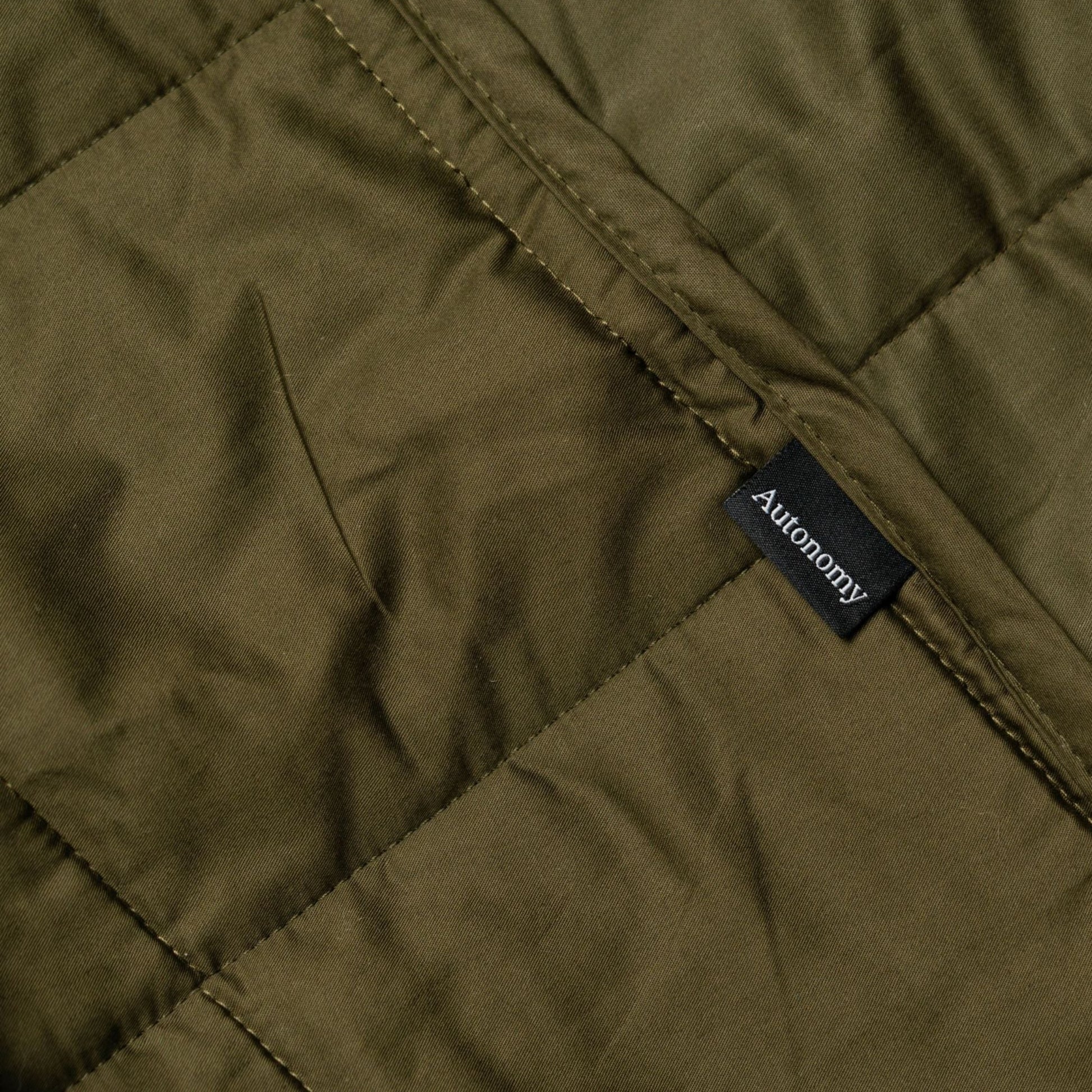 quality zoomed in shot of the autonomy back seat blanket pictured